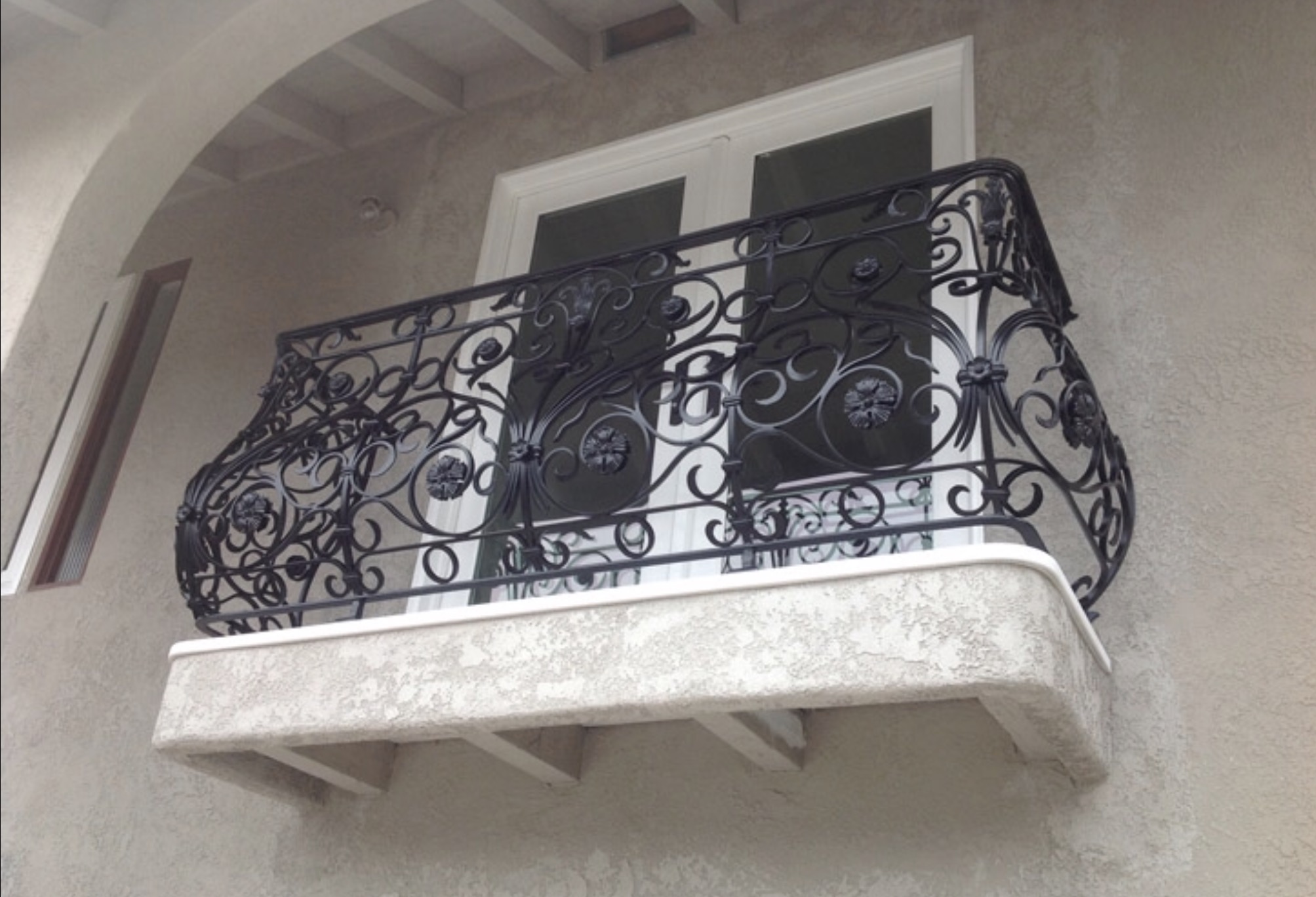 Vertical Bar Patio Railing with Scroll Accents