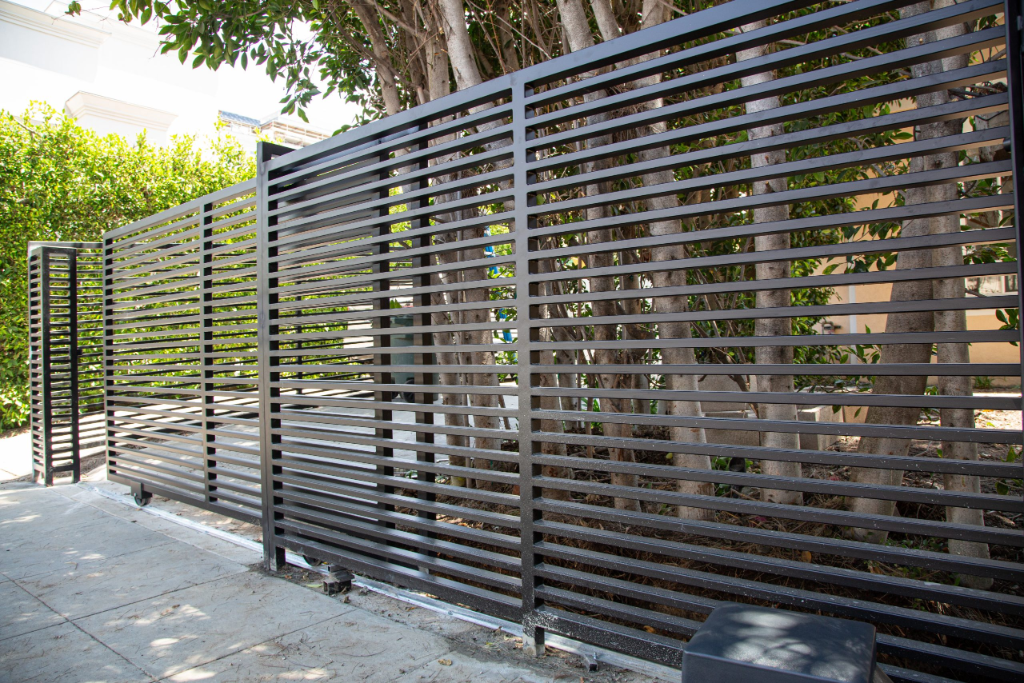 Modern Commercial Slide Gate — commercial iron work by Xtreme Iron Work