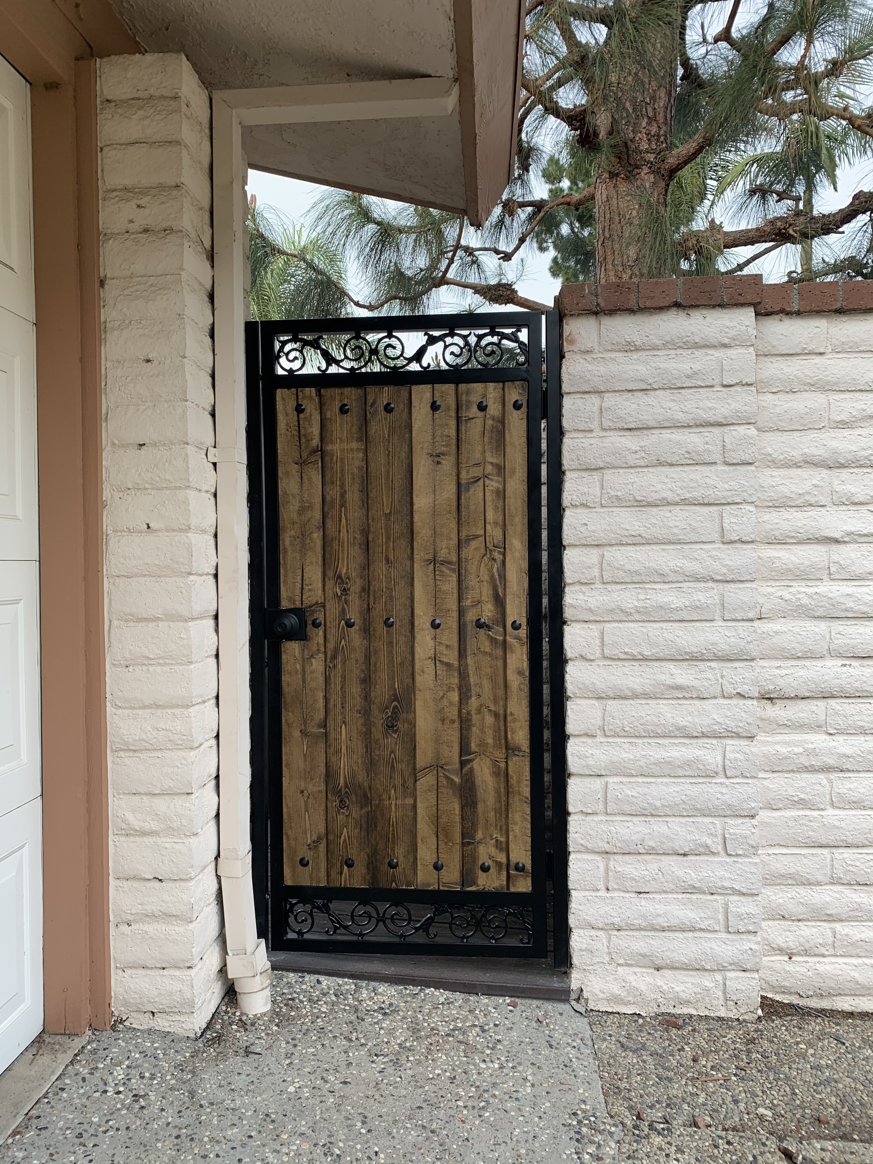 Scrollwork Arched Courtyard Gate