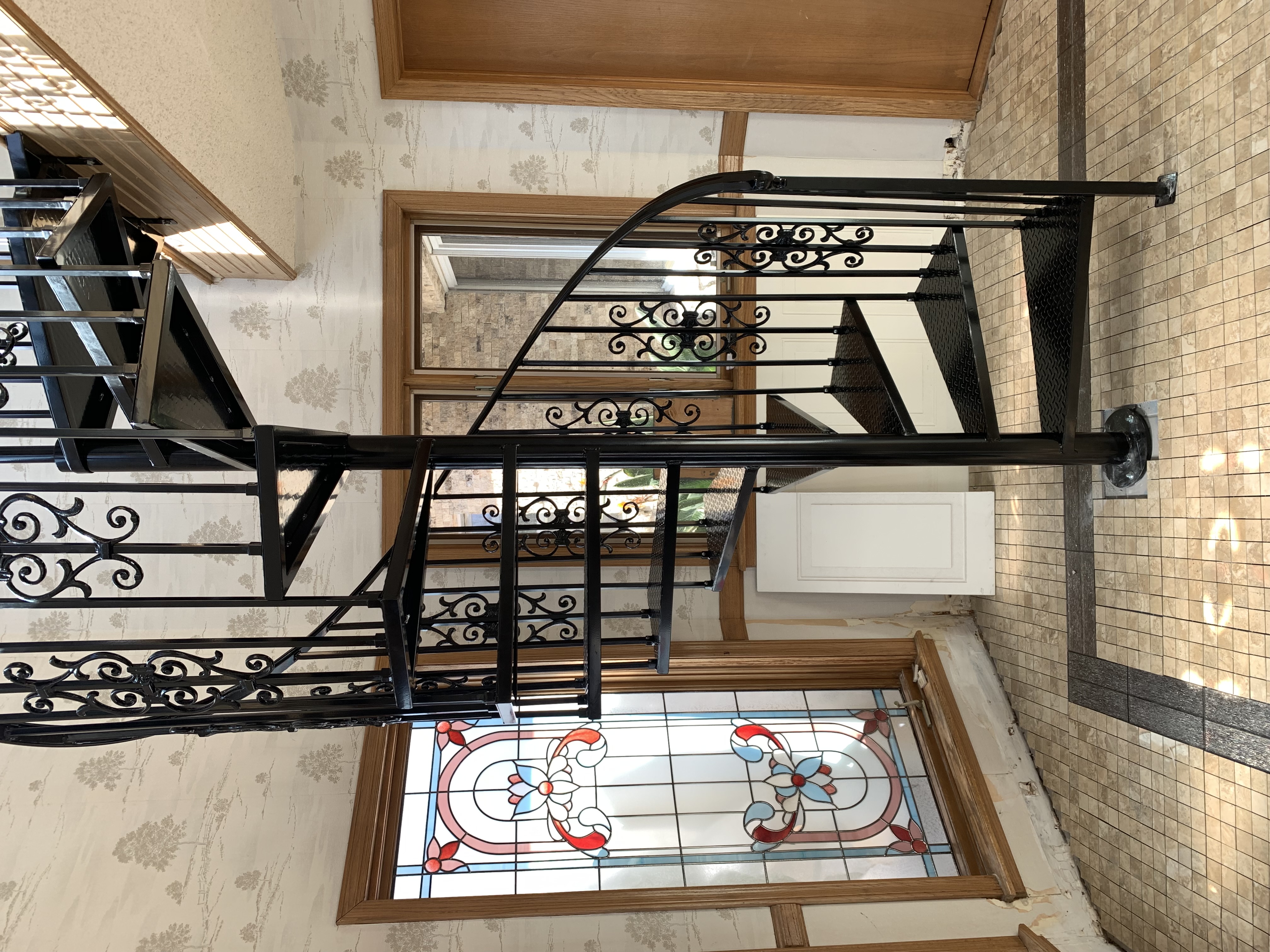 Ornate Spiral Staircase with Scrollwork