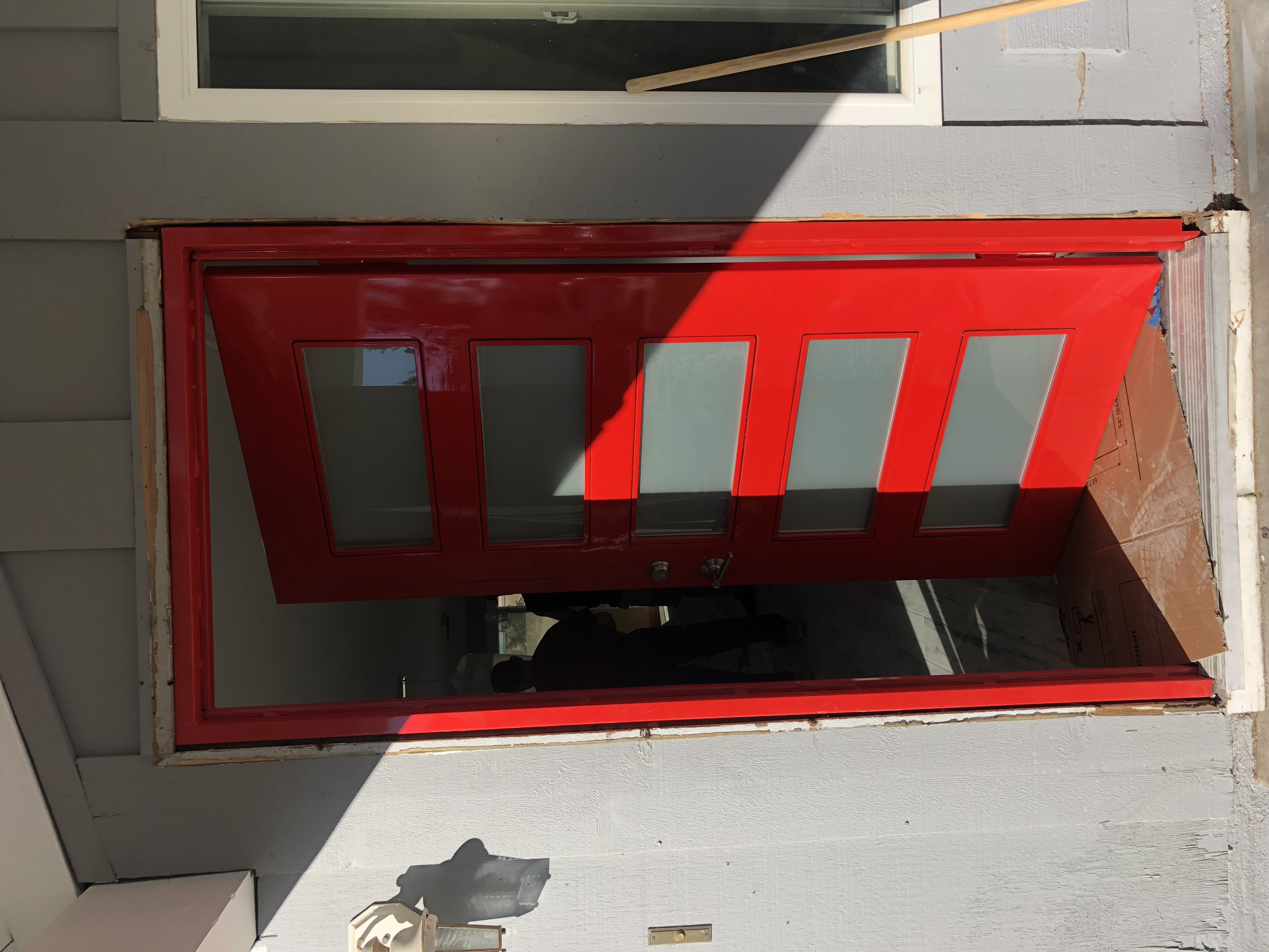 Modern Red Iron Entry Door with Glass Panels