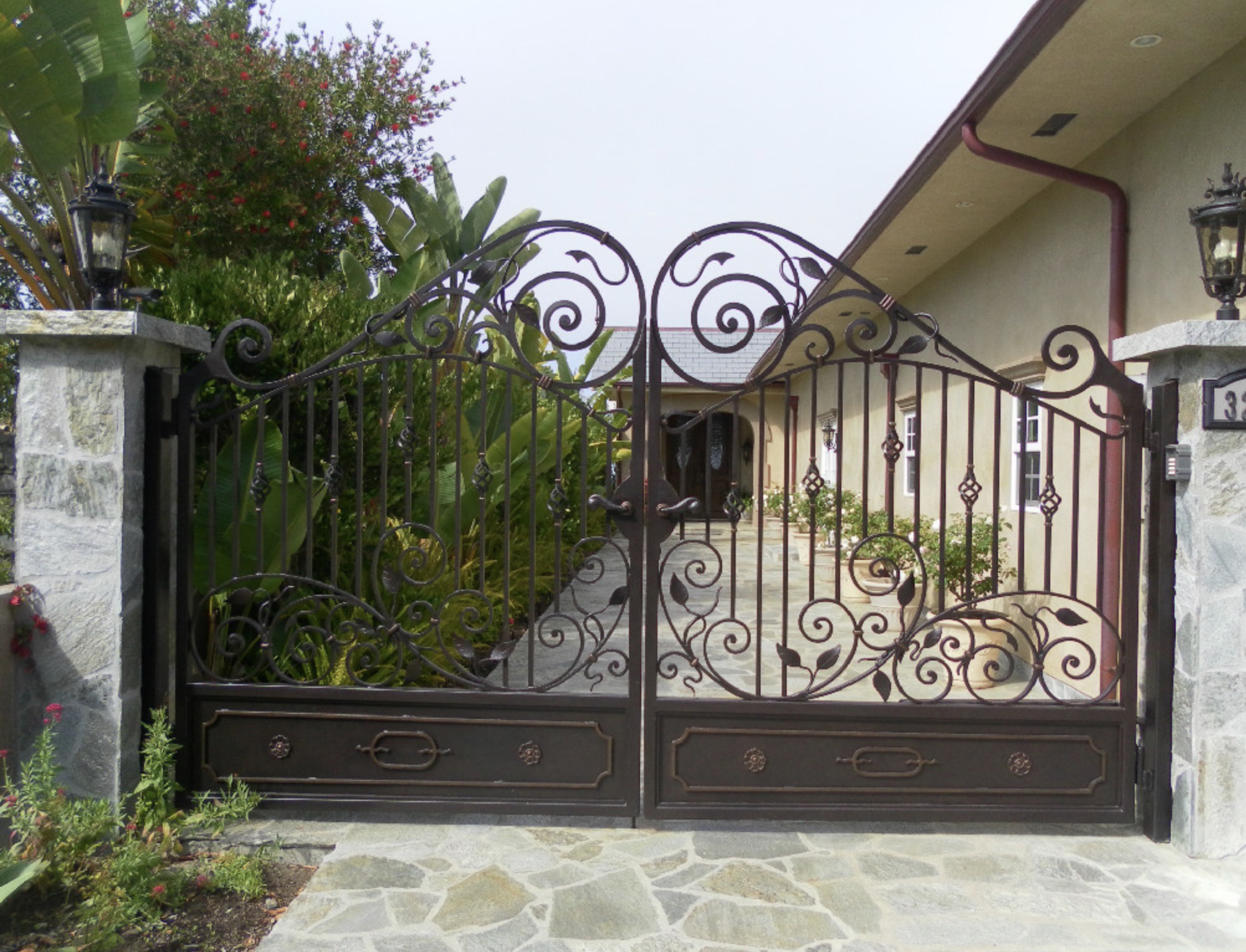 Arched Wood & Iron Driveway Gate