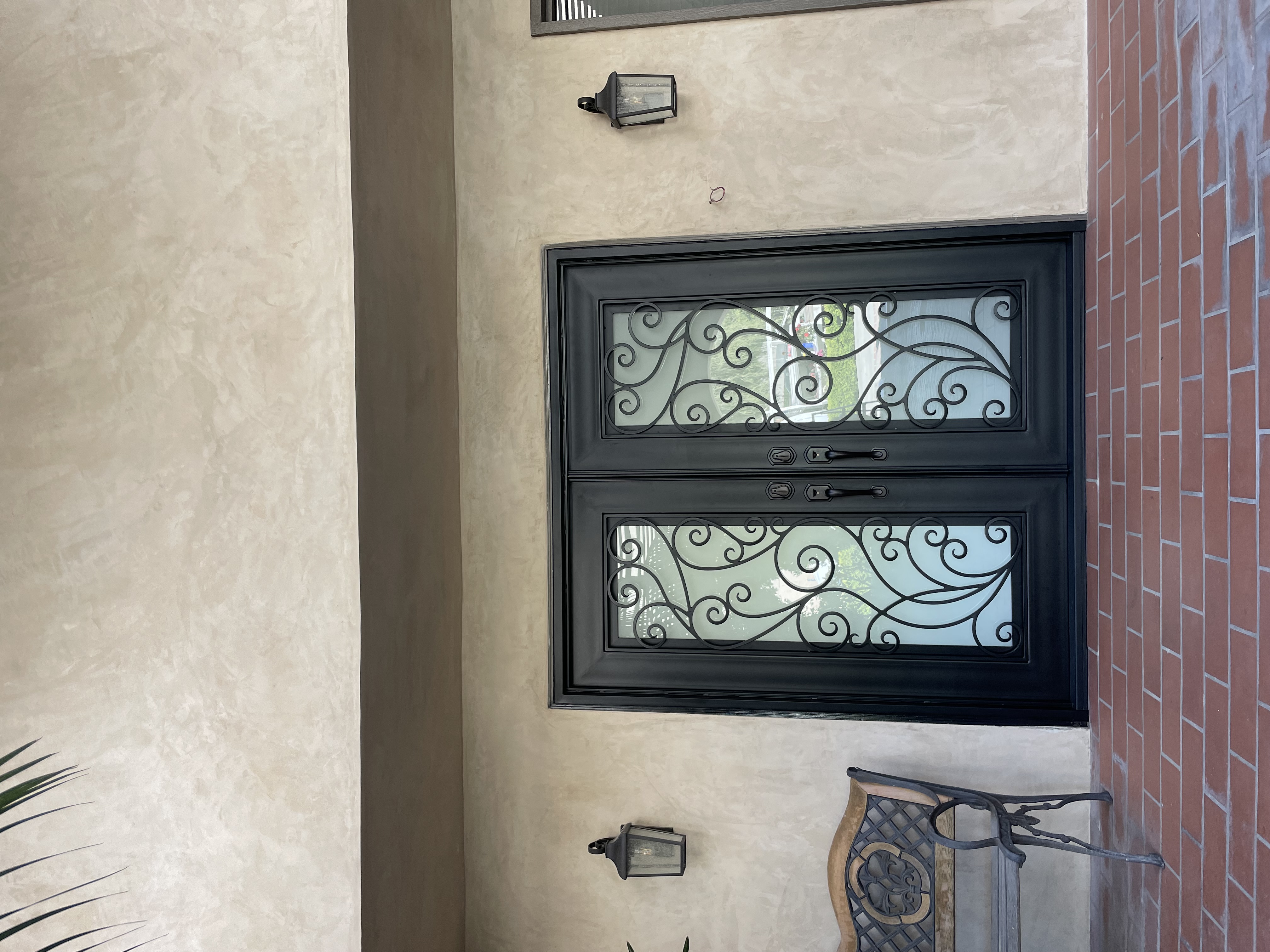 Ornate Double Iron Entry Door with Glass Panels