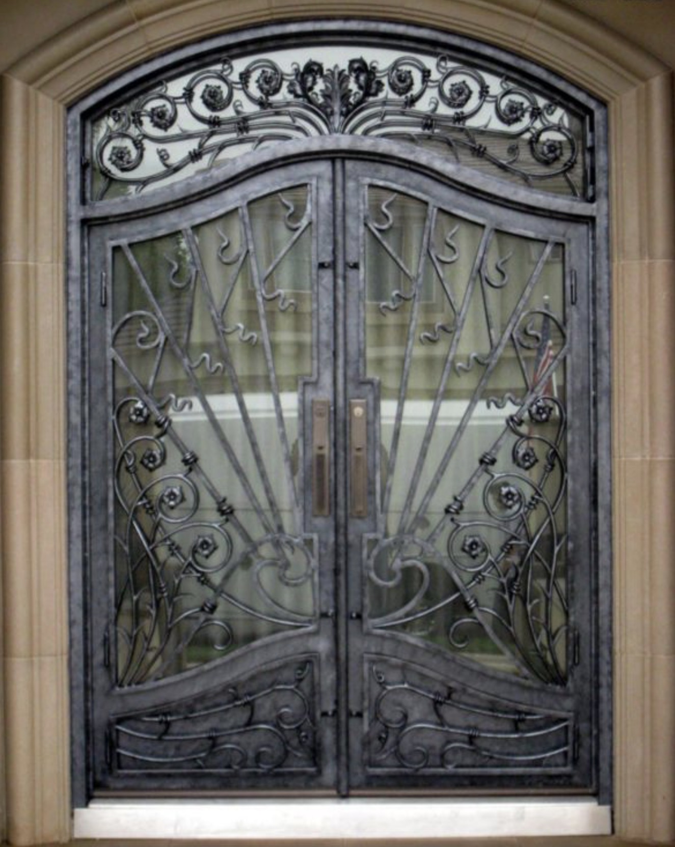 Art Nouveau Double Iron Door with Arched Transom