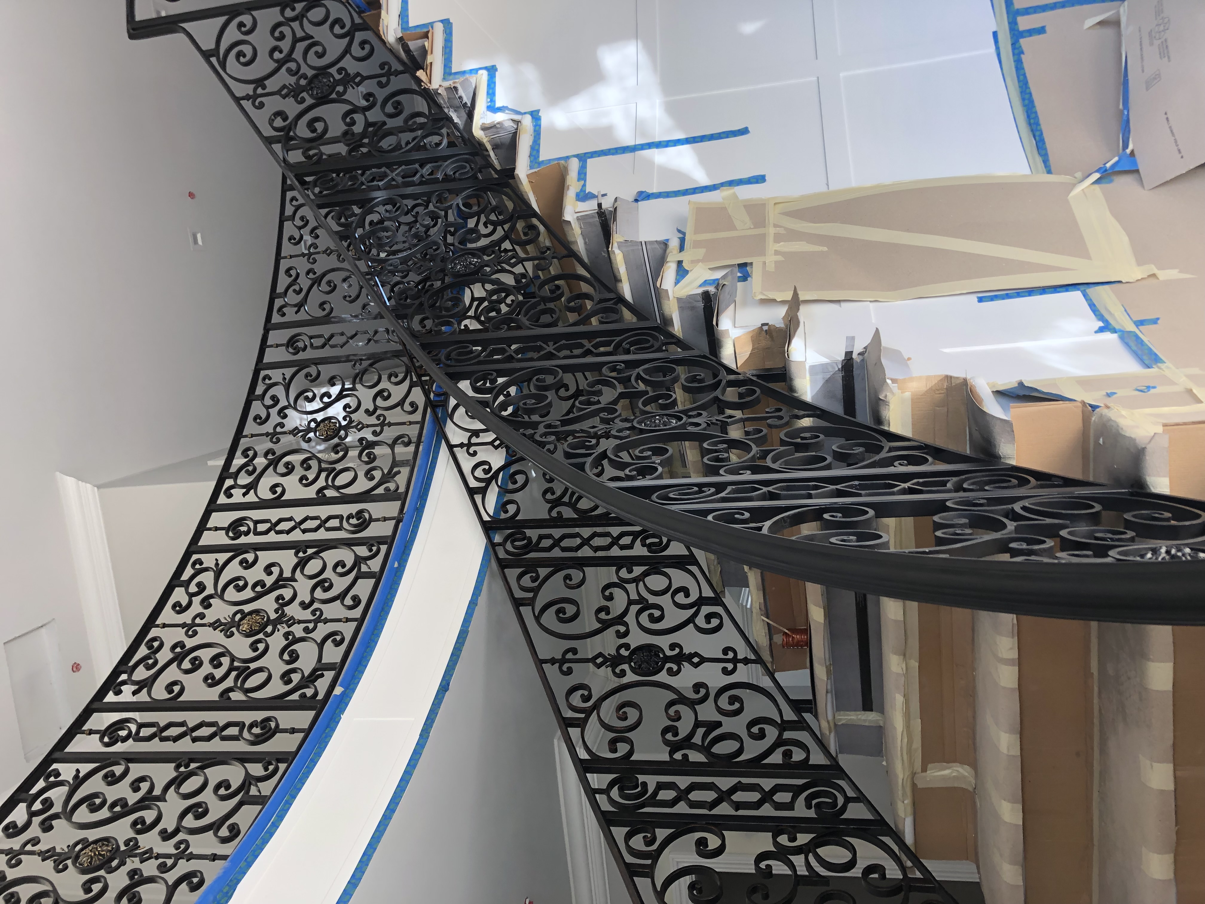 Curved Staircase Scrollwork Railing Under Construction