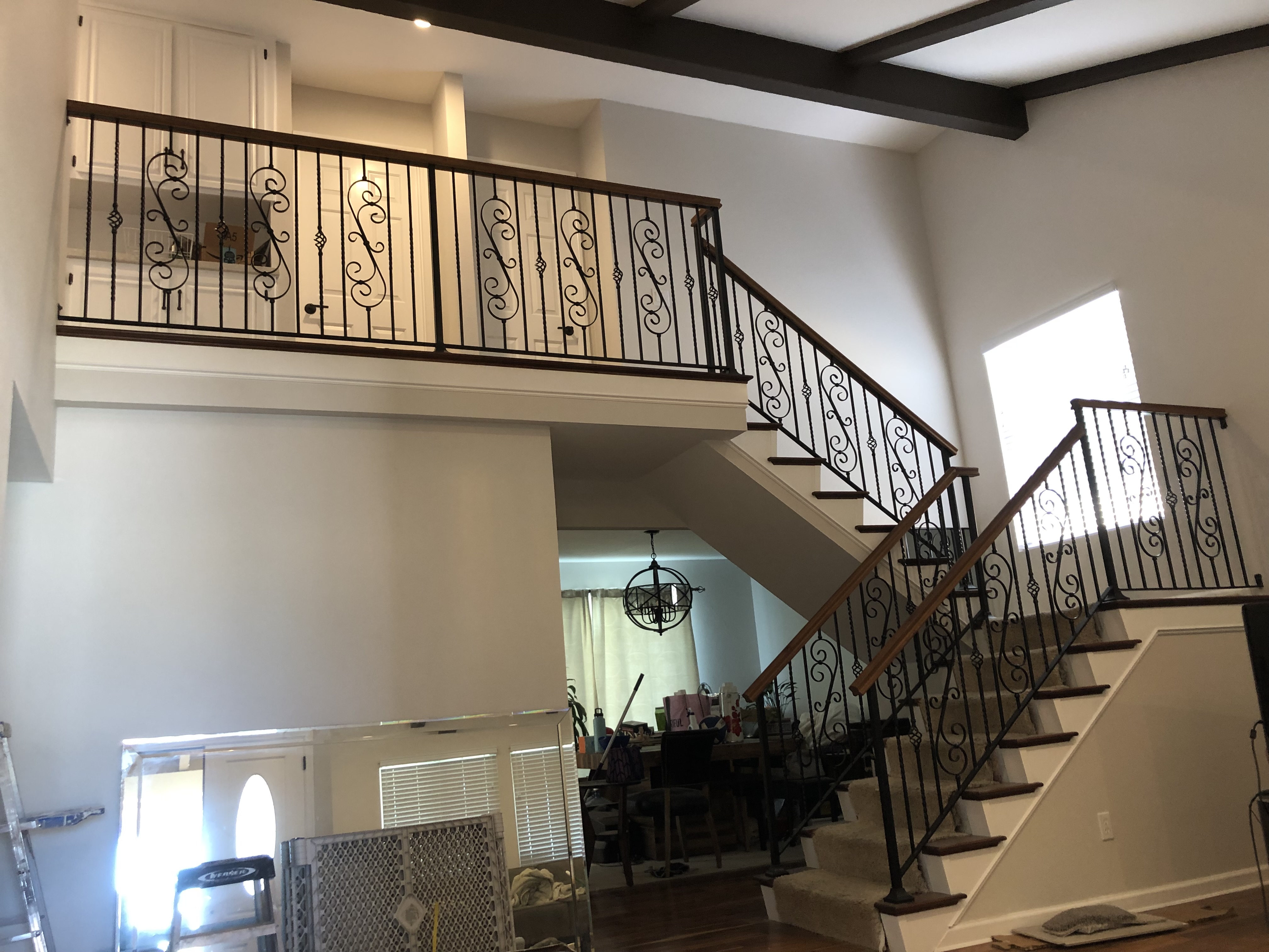 Gothic Arch Iron Staircase Railing in Estate Home