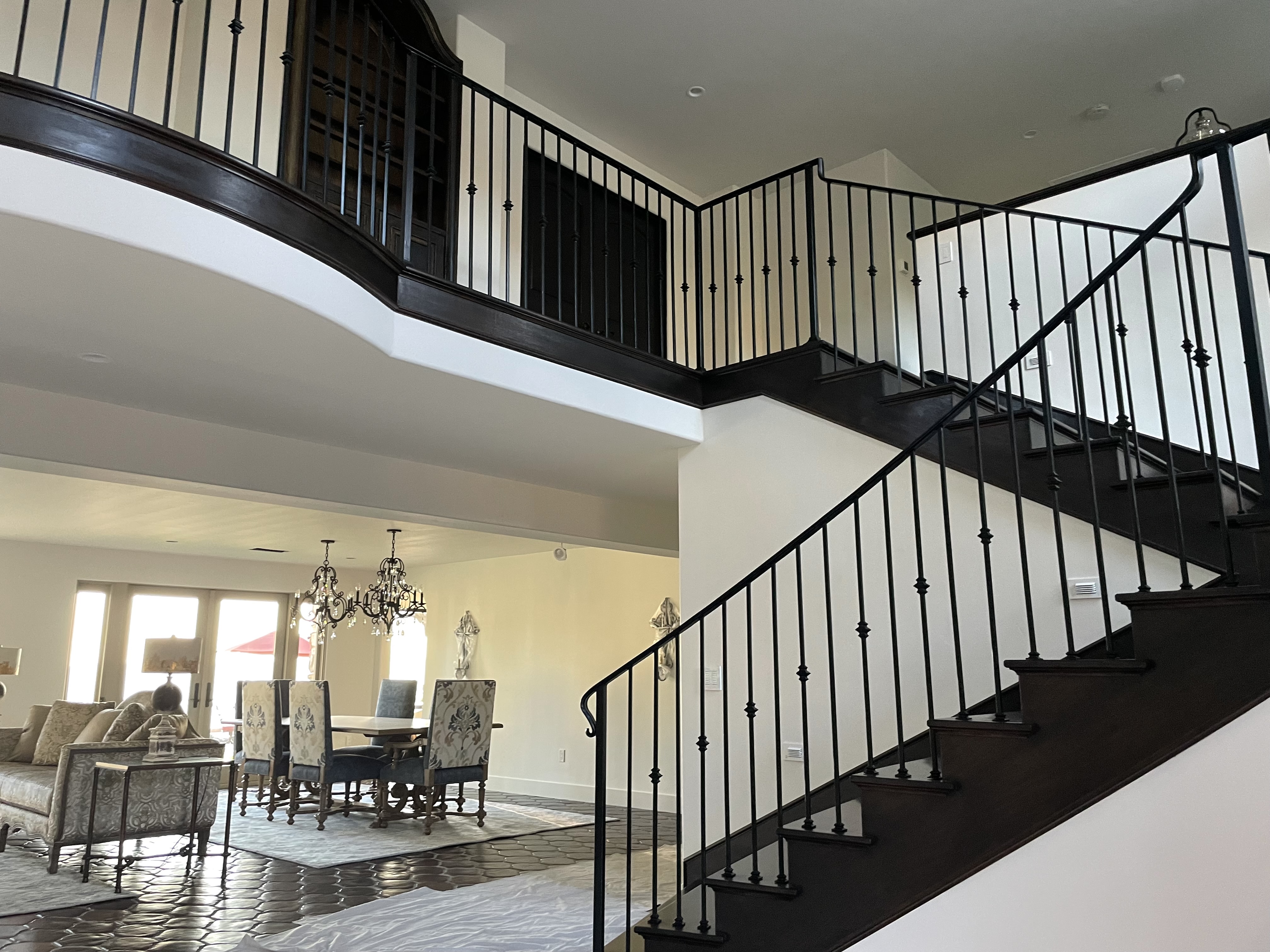 Modern Iron Horizontal Bar Staircase Railing on Dark Steps