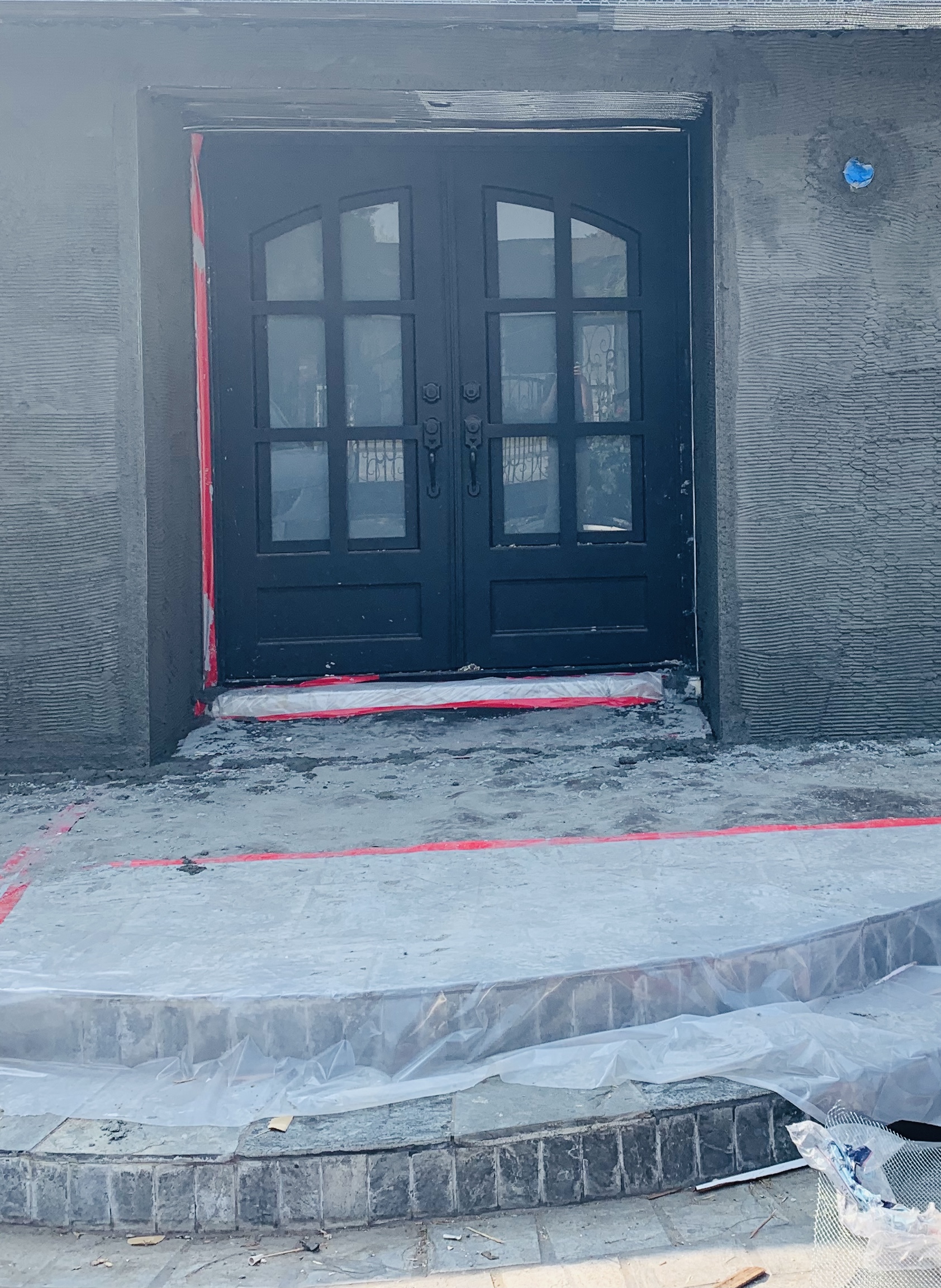 Single Scrollwork Iron Door with Sidelight