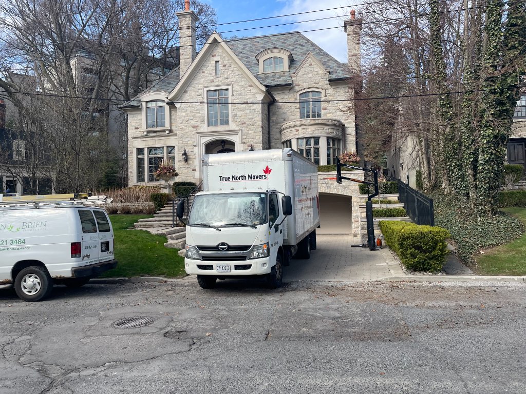 The original True North Movers crew with pickup truck and trailer
