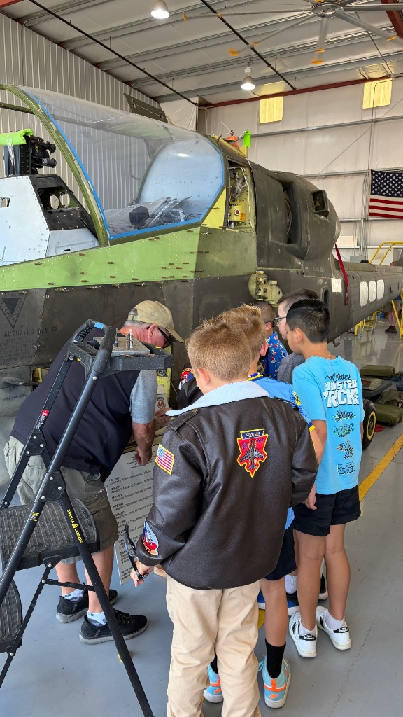 Kids in aircraft hangar