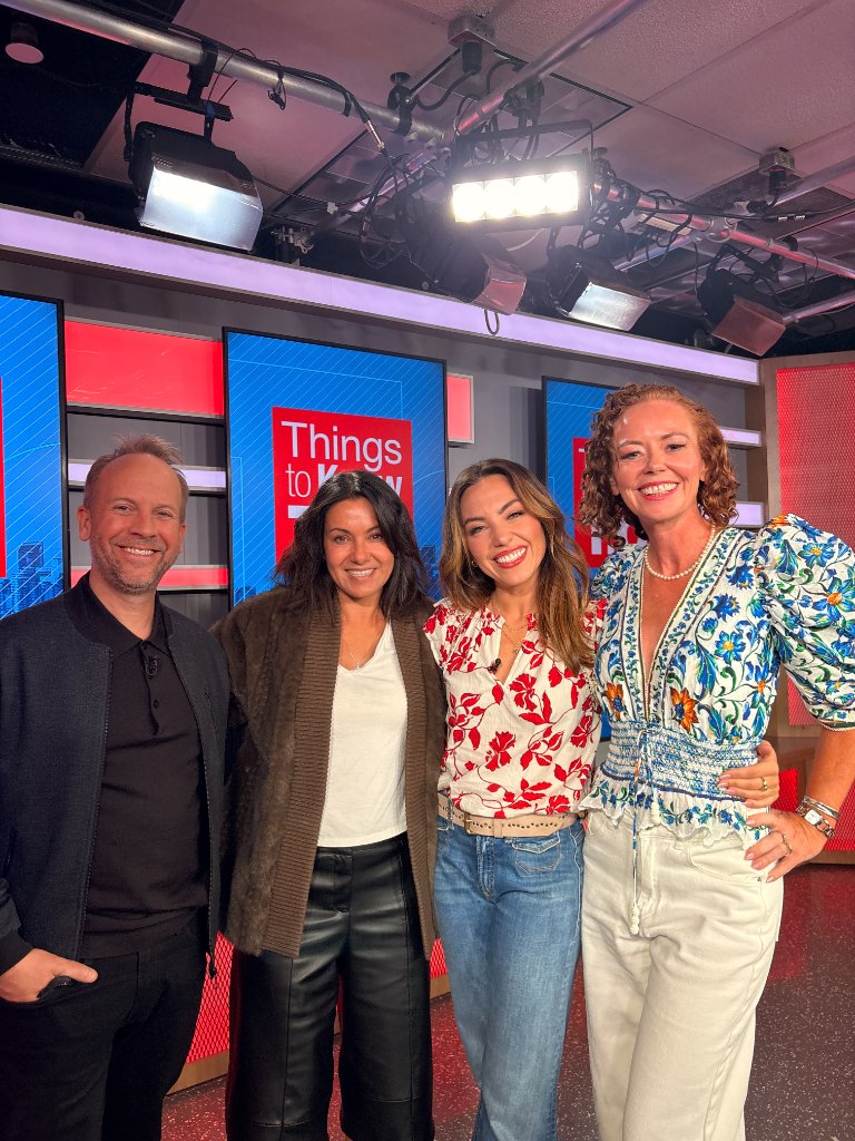 Maureen Dennis with the hosts and producer of Things to Know T.O.