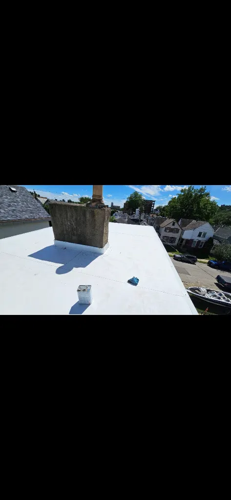 Real TNT Roofing project photo: commercial flat roof replacement in Alexandria, KY