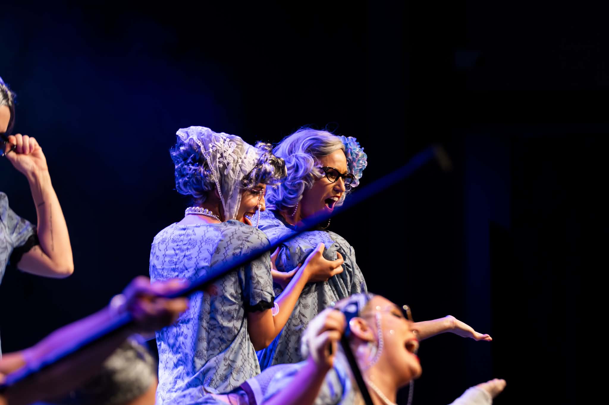 Jodi Salmond and Ayva Rose dressed as grannies performing together in a burlesque show
