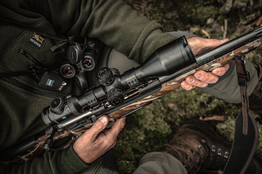 Close-up of Sako rifle with Zeiss scope and Swazi clothing — professional stalking fieldcraft