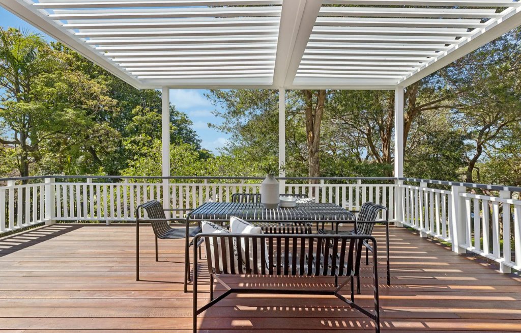 White Louvred Pergola with Outdoor Dining Setting