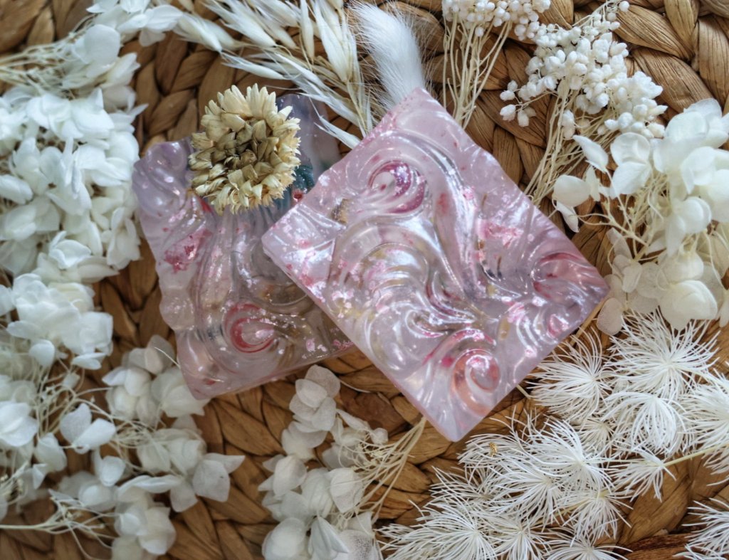Pink pearl swirl soap bars with white dried flowers product photography