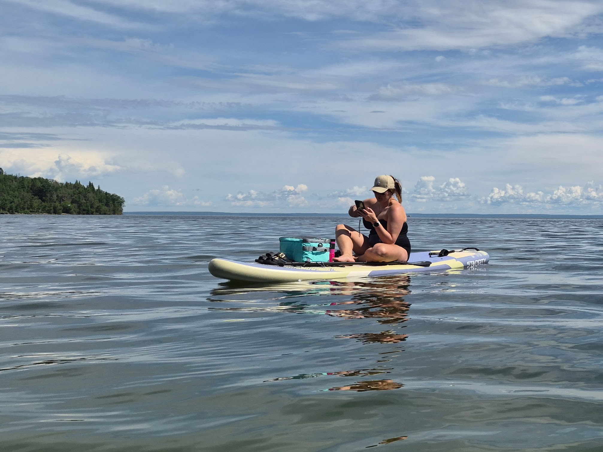 Paddler using gear on the water