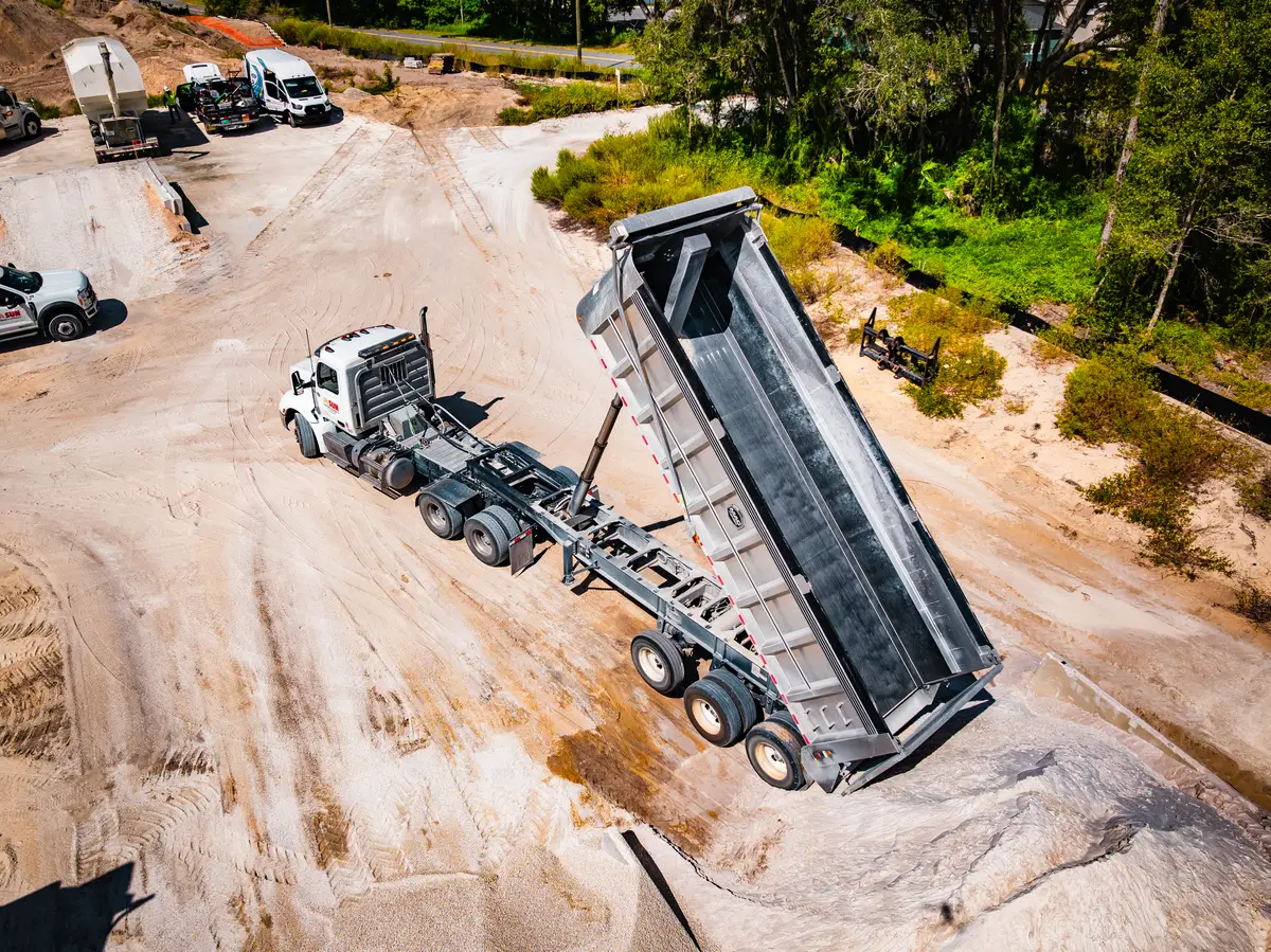 Dump trailer raised after unloading at the yard
