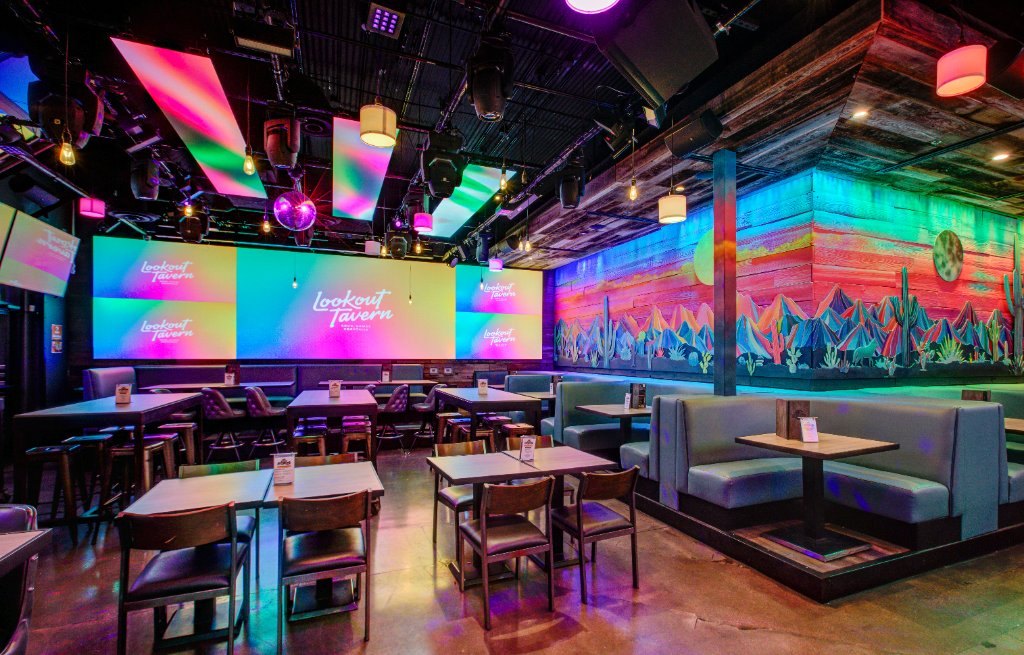 Guests at a game night in the LED room at Lookout Tavern