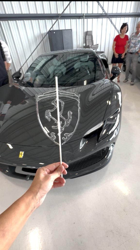 Clear sugar Ferrari logo lollipop