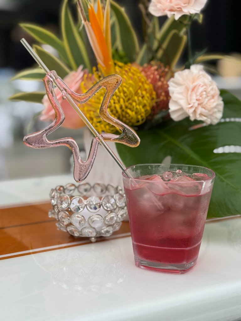Custom sugar drink stir stick at upscale setting