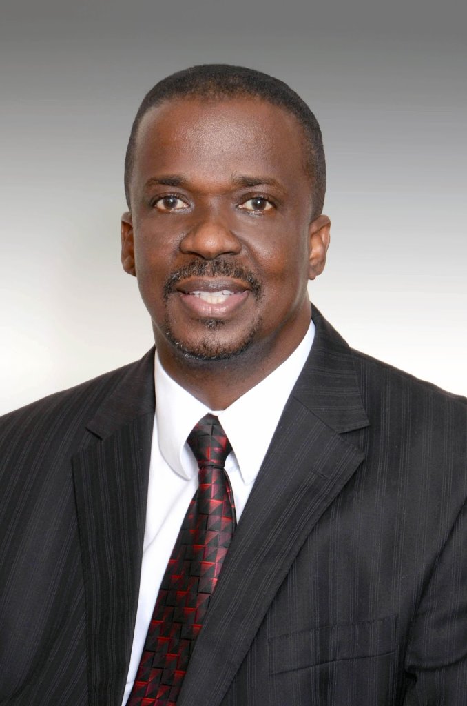 Rev. Dr. Devon Dick — Senior Pastor