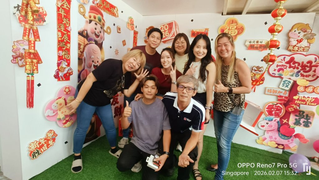 Festive team photo at the CNY photo booth