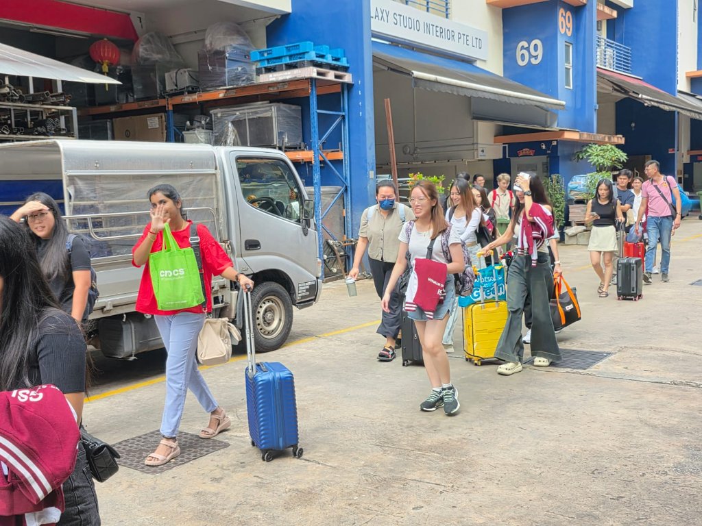 All hands on deck — the full team ready to board