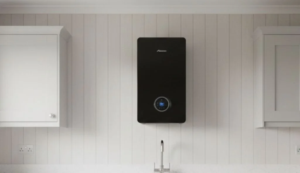 Black Worcester Bosch wall-mounted combi boiler installed in a modern kitchen with white panelling in Local air conditioning installation specialists in Billericay, CM12 & surrounding Essex areas. F-Gas certified engineers, top brands, full warranties., Air Conditioning