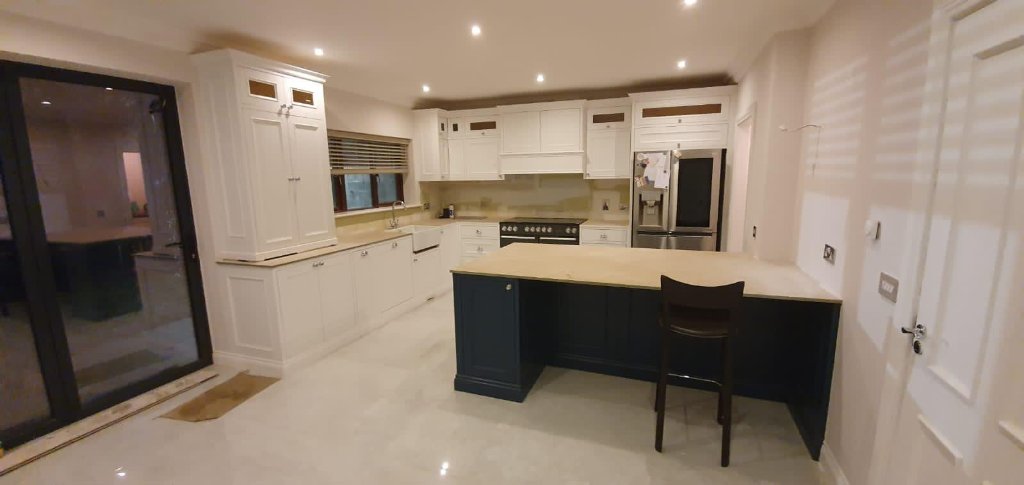 Bespoke white and navy kitchen with island by HEFF