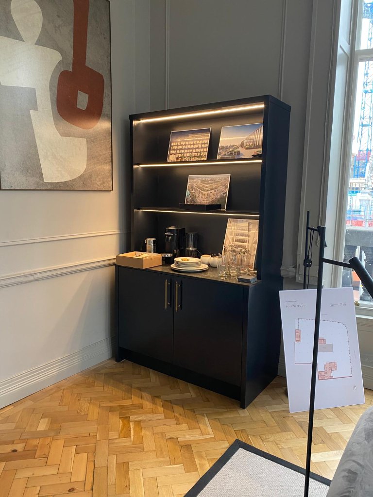 Bespoke dark display cabinet with integrated lighting by HEFF