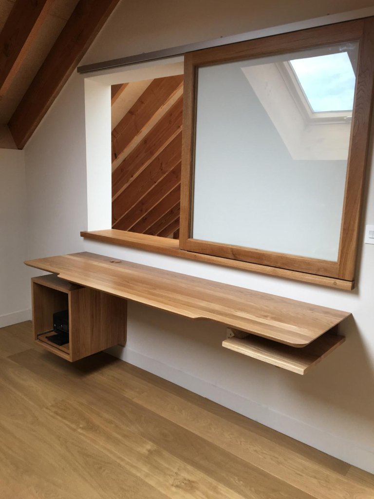Bespoke solid oak floating desk with integrated storage by HEFF