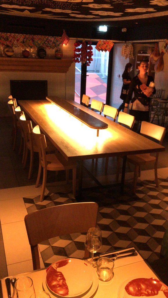 Bespoke restaurant dining table with integrated lighting by HEFF