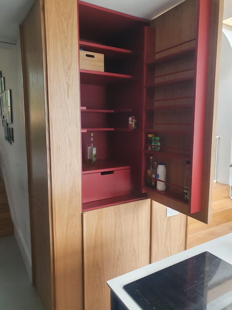 Bespoke oak pantry larder unit with painted interior by HEFF