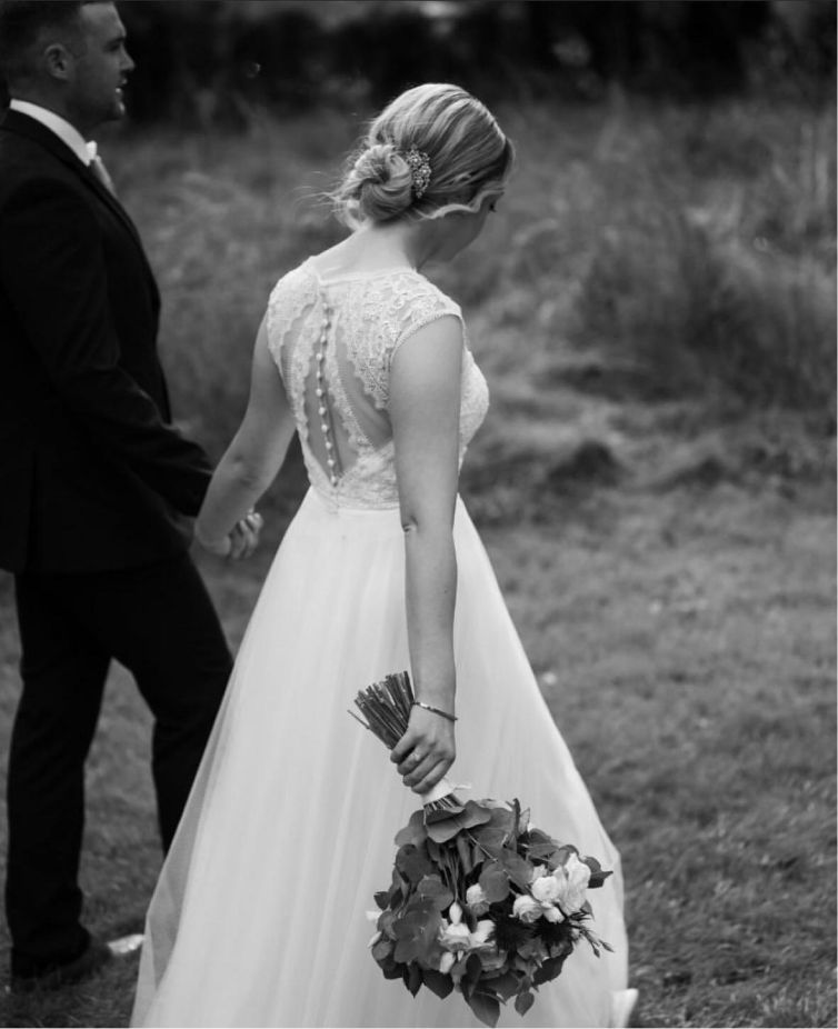 Bride and groom walking