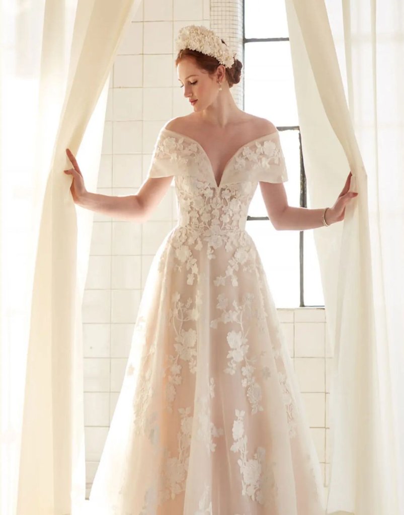 Bride in off-shoulder floral gown