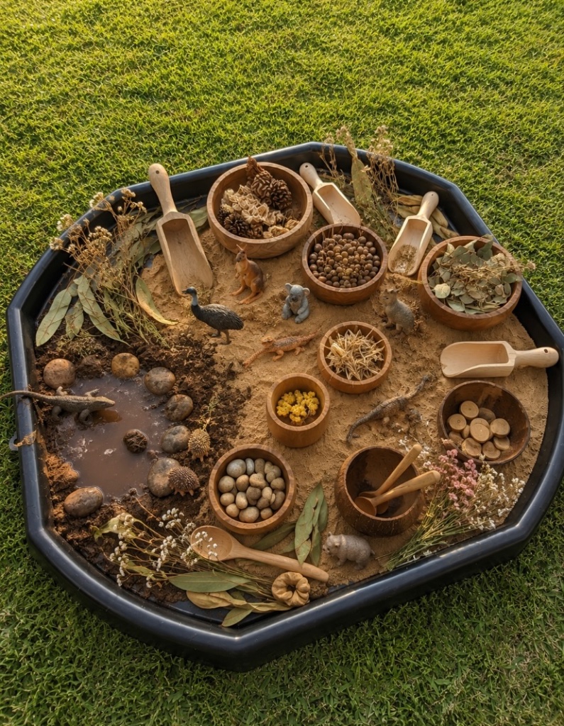 Nature sensory tray with animal figurines and wooden scoops