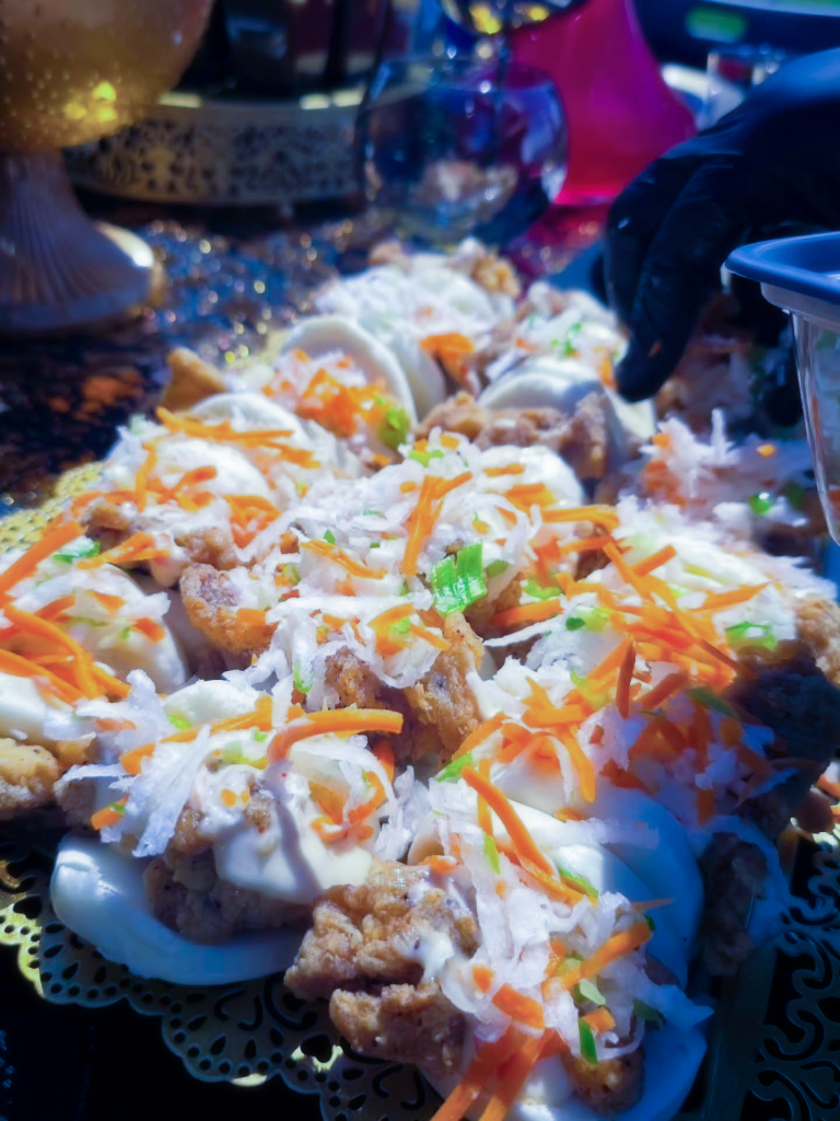 Catered food portions being prepared for service by Key’s Catering