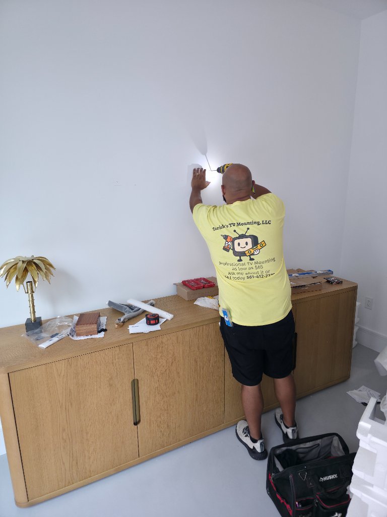 TV mounting installation in progress