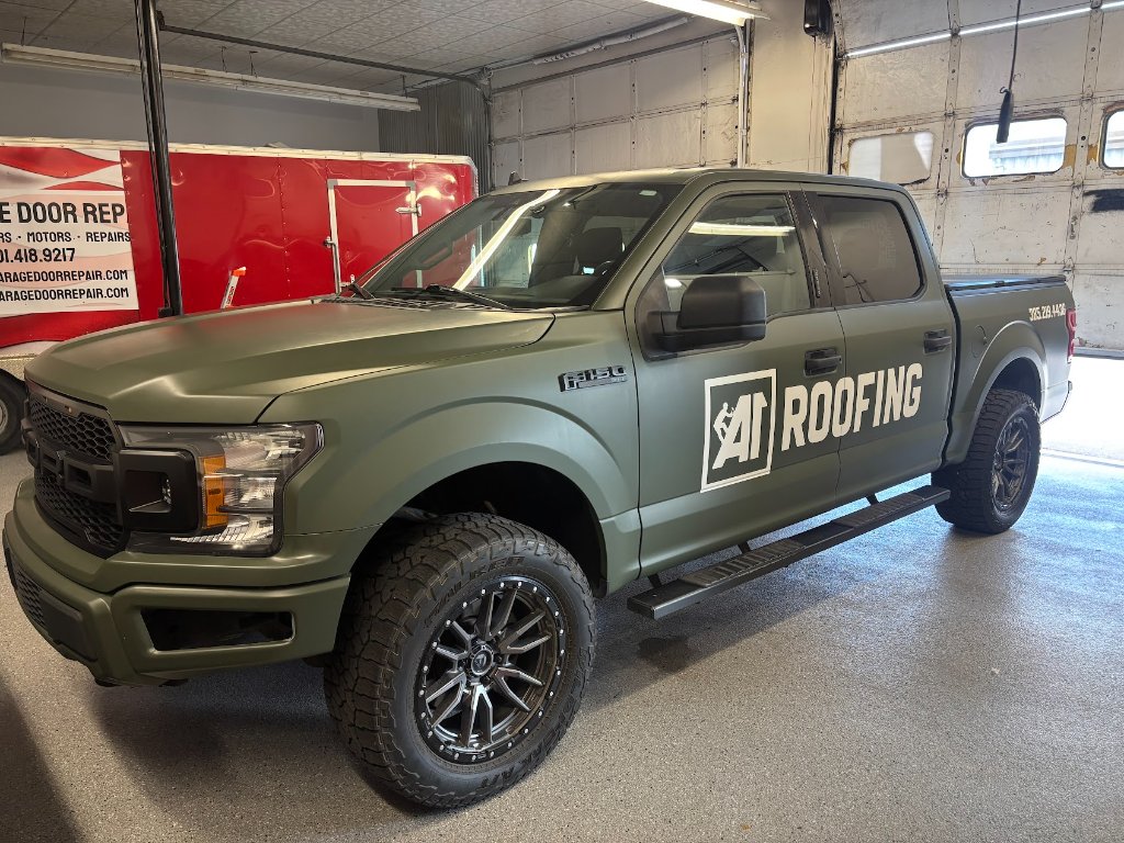 A1 Roofing matte green truck wrap