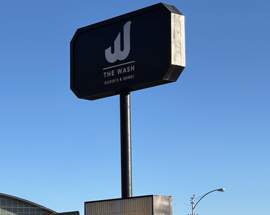 The Wash Desserts pylon sign