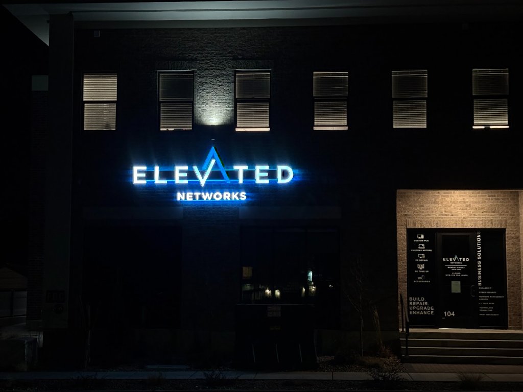 Elevated Networks illuminated channel letters at night