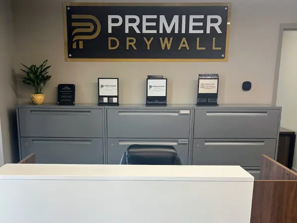 Premier Drywall interior lobby sign