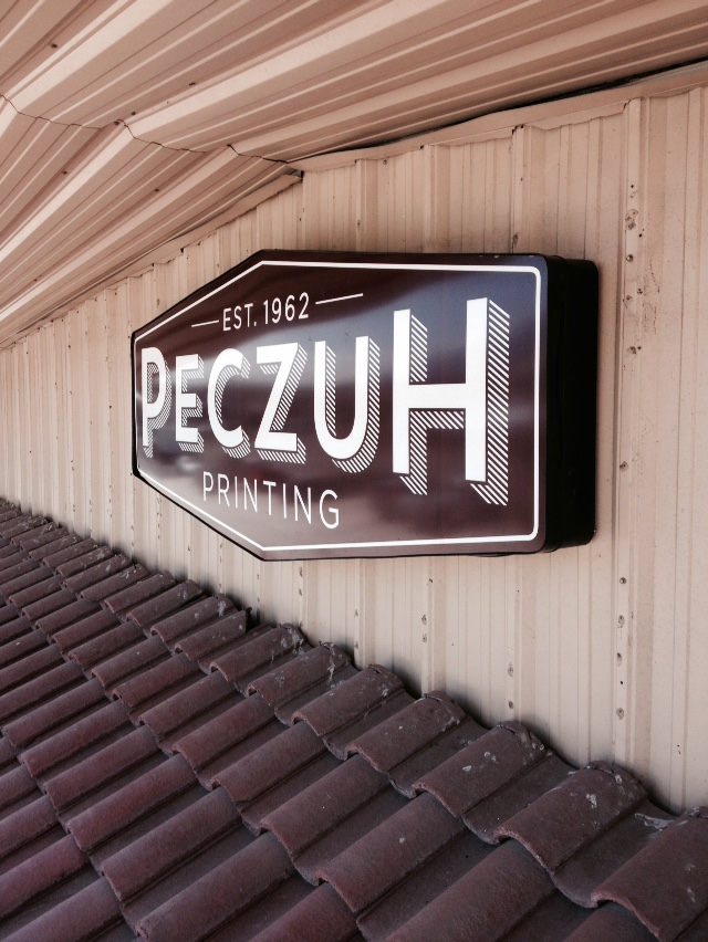 Peczuh Printing illuminated sign