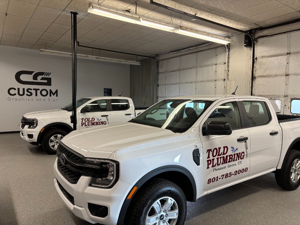 Told Plumbing fleet trucks
