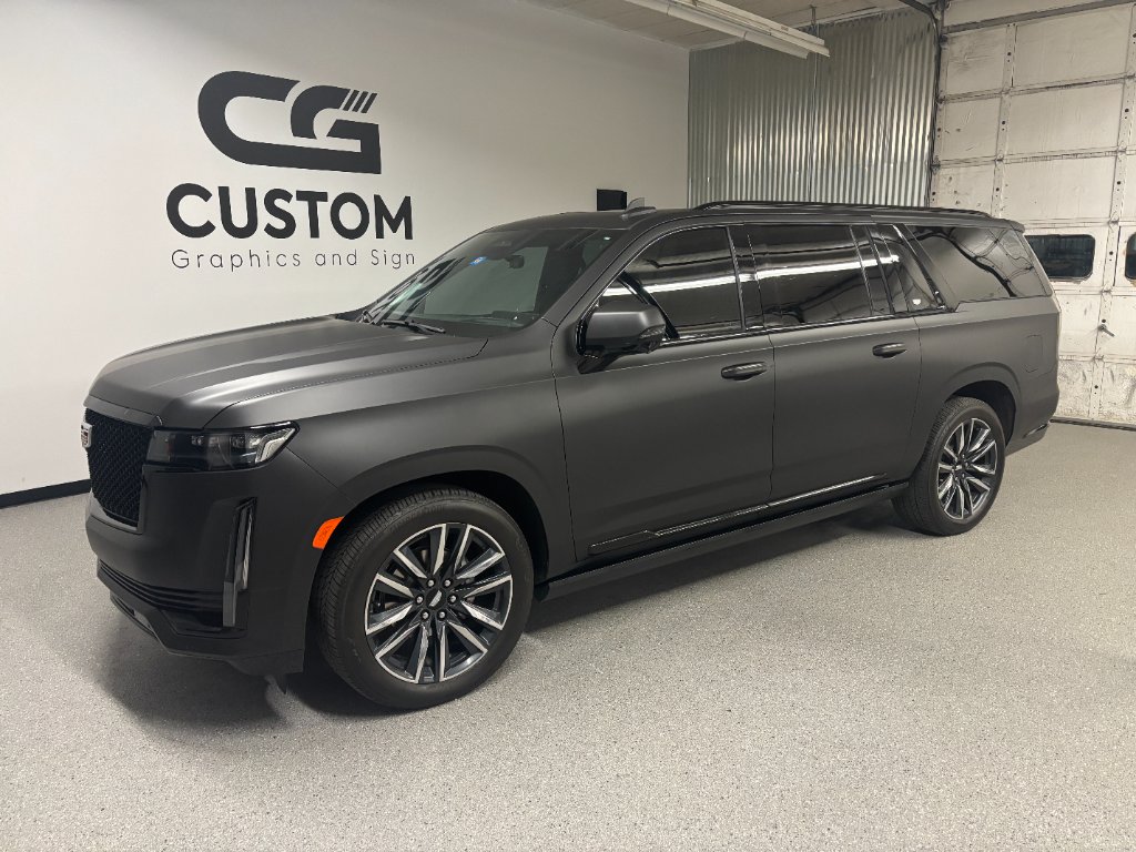 Cadillac Escalade matte black full vehicle wrap — Custom Graphics Utah