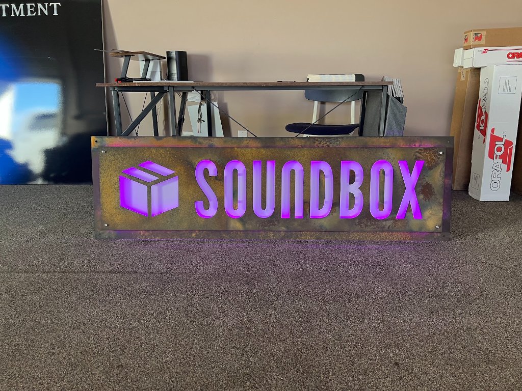 Soundbox illuminated storefront sign