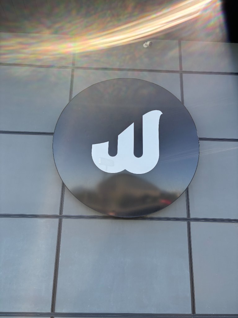 The Wash round dimensional logo sign