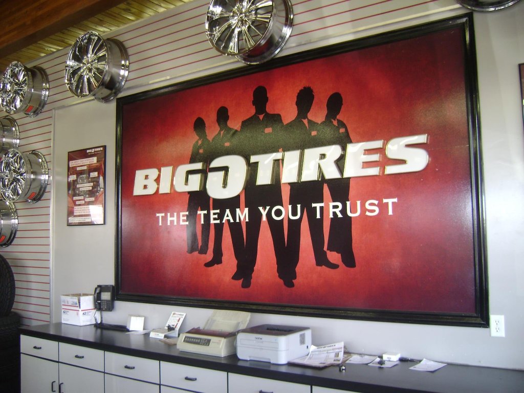 Big O Tires branded wall graphic and lobby display