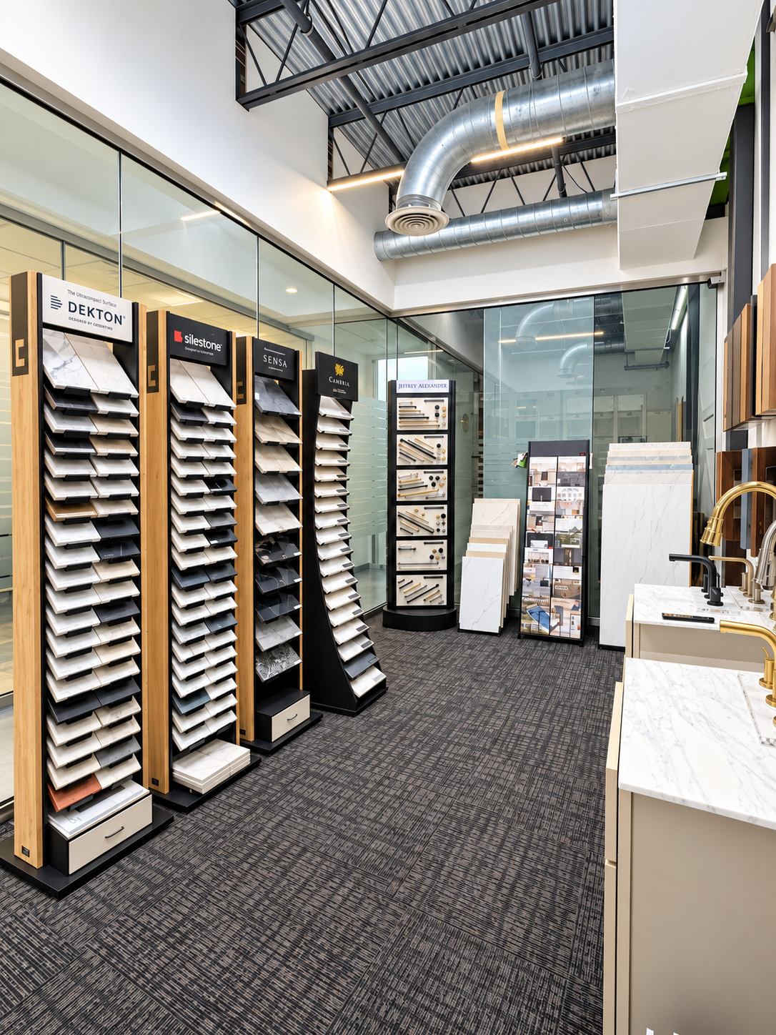 APEX Design Center showroom floor with branded surface displays